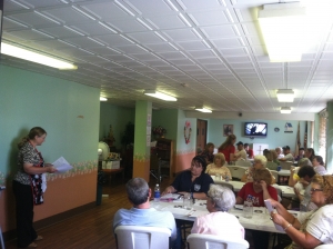 Kathy Wellman talks to workshop participants about sealing techniques