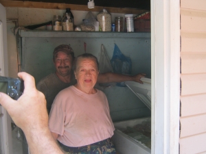 Kenny, Elizabeth and her deep freeze filled to the top with produce from her garden.