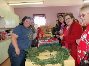 Kristin Smith, Whitley County Extension Office leads a class in wreath making.