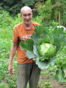 2012. Happy gardeners with huge vegetables.
