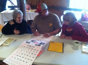 Grow Appalachia participants study Bernie's Almanac Calendar