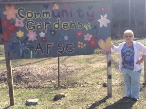 Bea Sias, Outreach Coordinator for Grow Appalachia Logan, beside the community garden in Cora, WV
