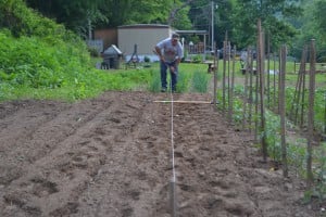 RBM GA member using a line to keep his rows straight