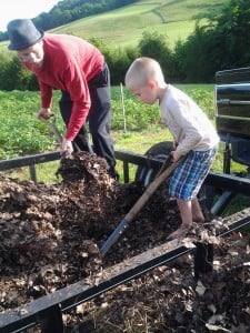 our youngest helper and his Dad monday nite loading leaf mulch