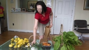 Miss Shirley choosing veggies from our garden.