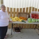 Gail Mills with youth produce