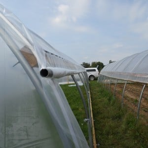 A close-up of the "roll-up" system for the side plastic.