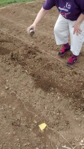 Alice Adding Fertilizer