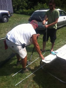 Here’s one of our gardeners, Randy, learning how to bend a section of EMT conduit into a “rib” for his midtunnel frame.