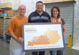 Feeding America, Kentucky's Heartland Executive Director Gary Miles, Representative Dean Schamore, and Kentucky Association of Food Banks Director Tamara Sandberg