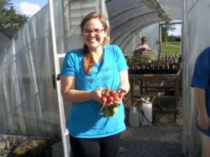 Jessica and her very first radish harvest!