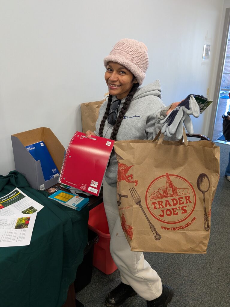 Elizabeth Orellana shows off her gardening supplies. Picture by Alexis Meza de los Santos.