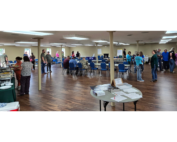 The phot shows a large group of people at a Grow Appalachia meeting.