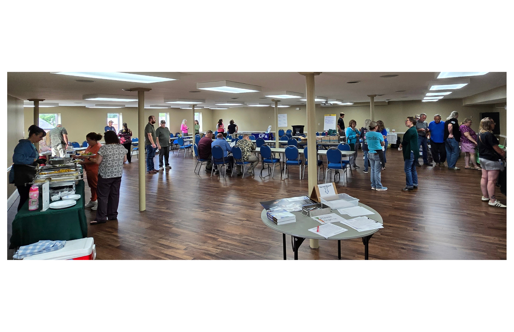 The phot shows a large group of people at a Grow Appalachia meeting.